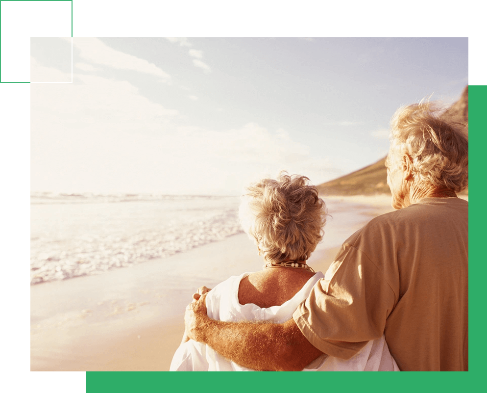 Old couple looking at beach